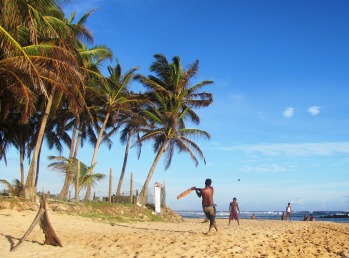 Local boys play a game of cricket at this popular Mirissa beach, almost empty of tourists in the low season. 